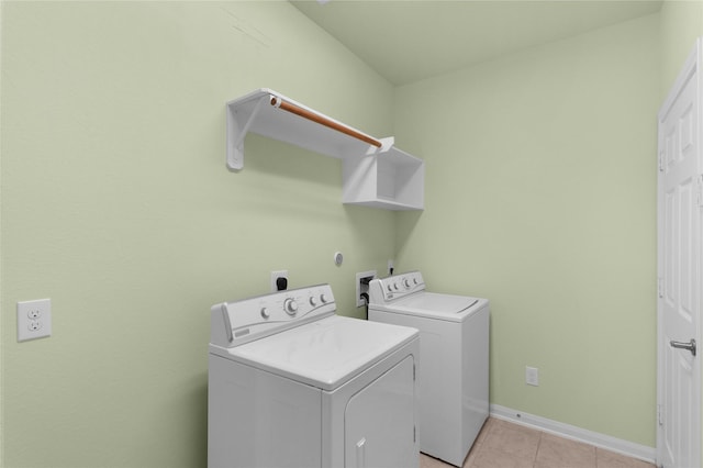 13406 Georgia Hollow Ct, Rosharon, TX 77583 - laundry room with independent washer and dryer, baseboards, and light tile patterned flooring