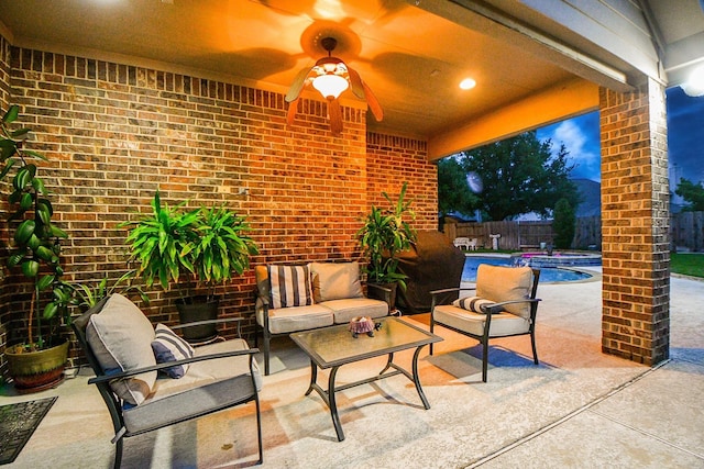 28030 Sugarside Glen Dr, Katy, TX 77494 - fenced backyard with a ceiling fan, an outdoor hangout area, and a patio