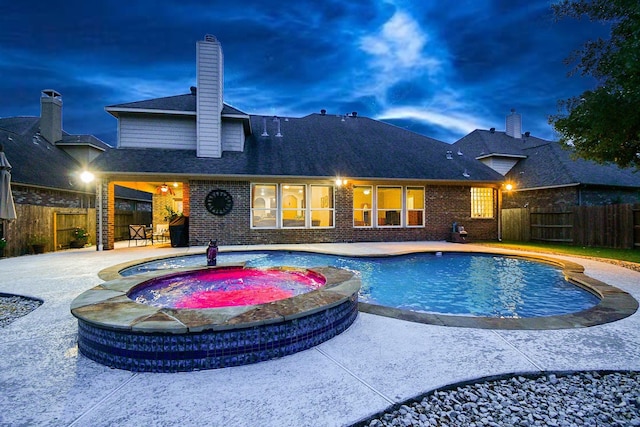 28030 Sugarside Glen Dr, Katy, TX 77494 - view of swimming pool with a fenced backyard, a patio area, and a pool with connected hot tub