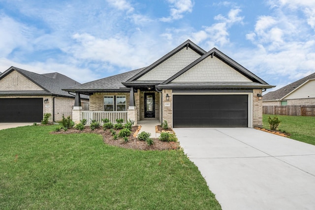 15885 Hayes Market Loop, Conroe, TX 77302 - craftsman house featuring brick siding, driveway, an attached garage, and covered porch