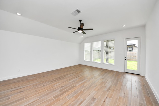 15885 Hayes Market Loop, Conroe, TX 77302 - empty room featuring baseboards, light wood-style flooring, lofted ceiling, ceiling fan, and recessed lighting