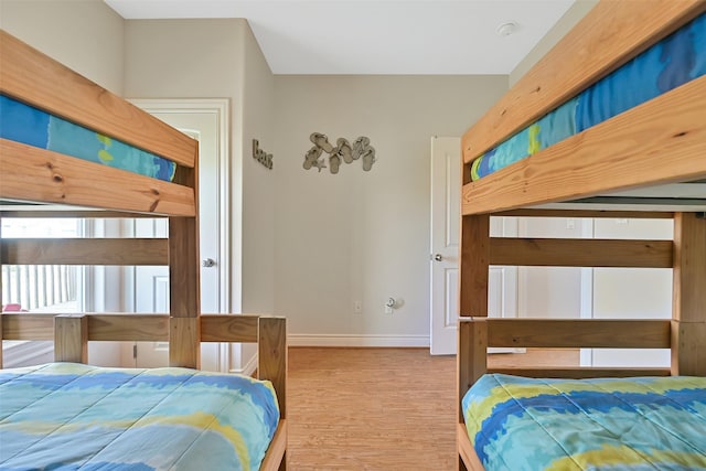 839 S Monkhouse Dr, Crystal Beach, TX 77650 - bedroom with baseboards and wood finished floors