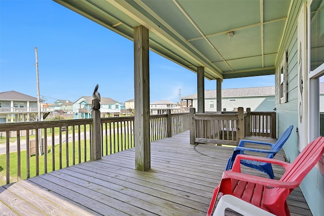 839 S Monkhouse Dr, Crystal Beach, TX 77650 - deck with a residential view and a lawn