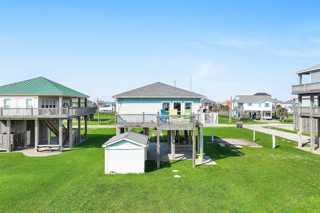 839 S Monkhouse Dr, Crystal Beach, TX 77650 - dock with stairs, a wooden deck, a yard, and a residential view