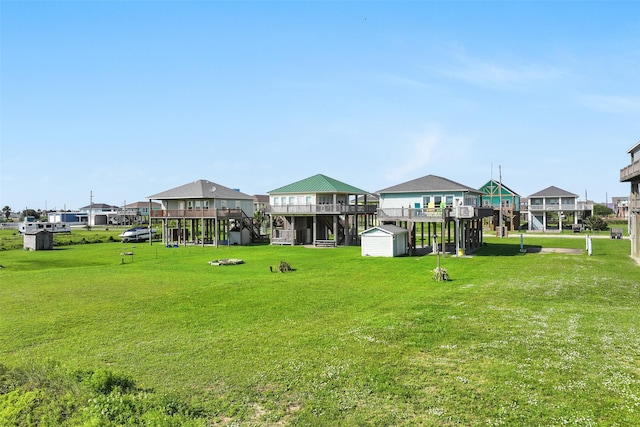 839 S Monkhouse Dr, Crystal Beach, TX 77650 - surrounding community featuring a yard