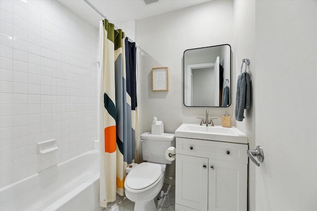 646 Lester St, Houston, TX 77007 - full bathroom with toilet, vanity, shower / bath combo with shower curtain, and tile patterned flooring