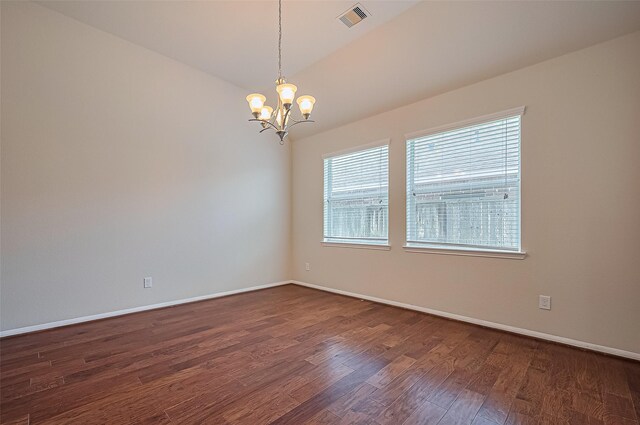 3934 Medici Ct, Missouri City, TX 77459 - empty room featuring dark wood finished floors, a chandelier, baseboards, and vaulted ceiling