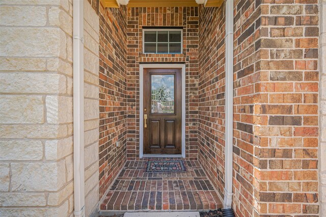 3934 Medici Ct, Missouri City, TX 77459 - doorway to property featuring brick siding