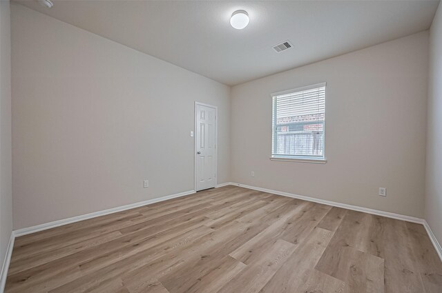 3934 Medici Ct, Missouri City, TX 77459 - unfurnished room featuring light wood-type flooring and baseboards