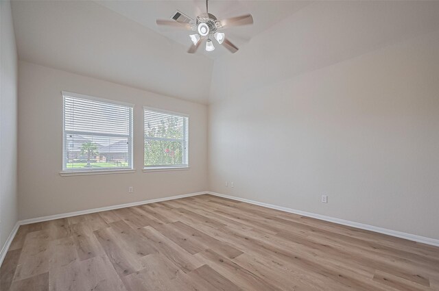 3934 Medici Ct, Missouri City, TX 77459 - empty room featuring light wood-style floors, ceiling fan, baseboards, and high vaulted ceiling