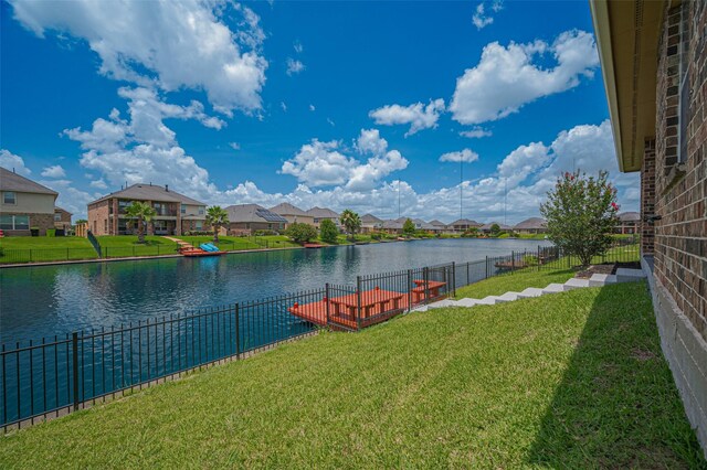 3934 Medici Ct, Missouri City, TX 77459 - view of yard with a residential view and a water view