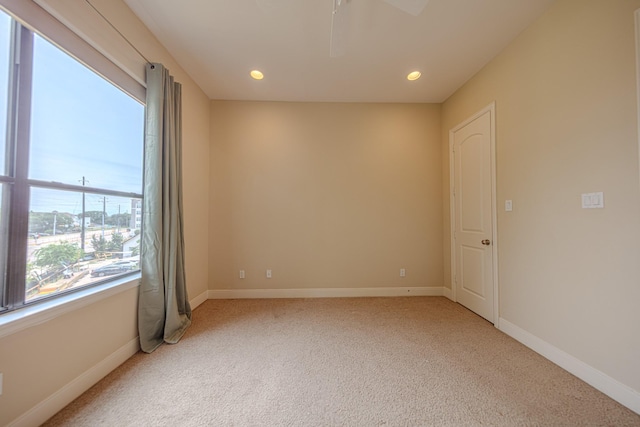 1205 Sampson St, Houston, TX 77003 - carpeted empty room with a ceiling fan and recessed lighting