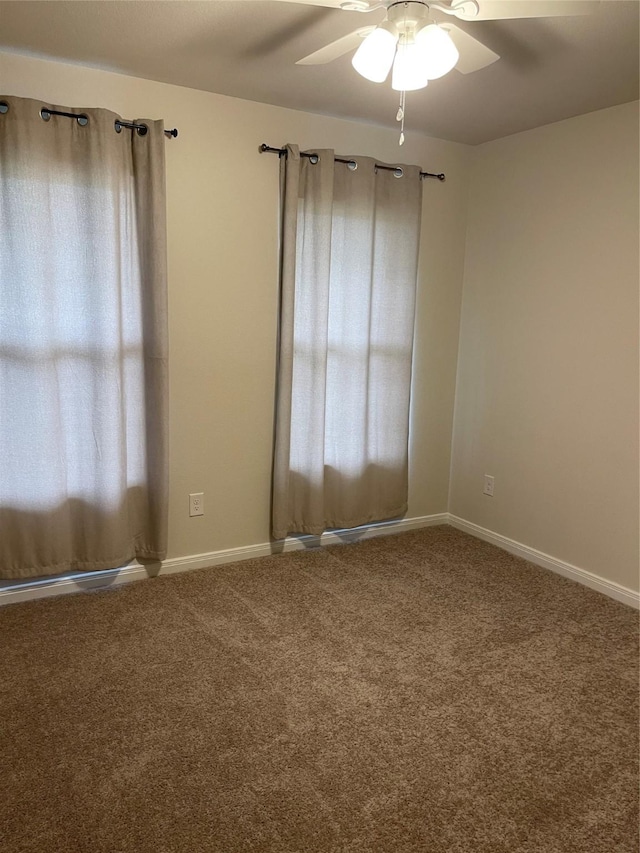 15508 Taylorcrest Dr, Conroe, TX 77306 - spare room with carpet, a ceiling fan, and baseboards