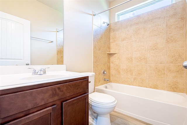 8138 Heartbrook Field Ln, Cypress, TX 77433 - bathroom featuring shower / bathtub combination, vanity, and wood finished floors