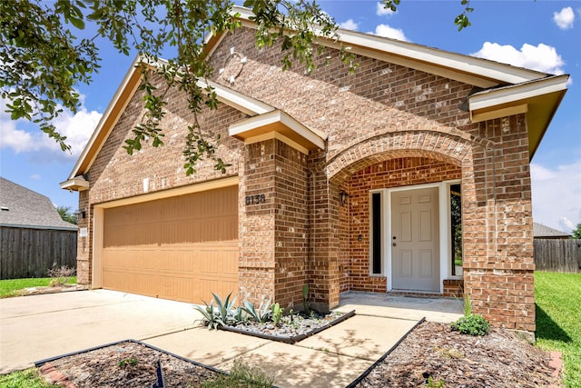 8138 Heartbrook Field Ln, Cypress, TX 77433 - view of front facade with brick siding, a garage, and concrete driveway