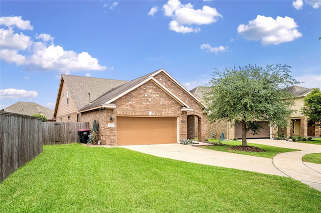 8138 Heartbrook Field Ln, Cypress, TX 77433 - view of front facade with brick siding, concrete driveway, and an attached garage