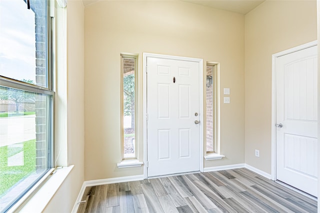 8138 Heartbrook Field Ln, Cypress, TX 77433 - entryway with healthy amount of natural light and wood finished floors