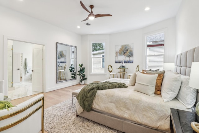 412 Hawthorne St, Houston, TX 77006 - bedroom featuring multiple windows, wood finished floors, recessed lighting, a ceiling fan, and ensuite bathroom