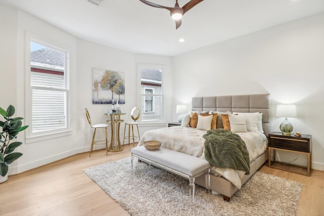 412 Hawthorne St, Houston, TX 77006 - bedroom featuring wood finished floors, baseboards, a ceiling fan, and recessed lighting