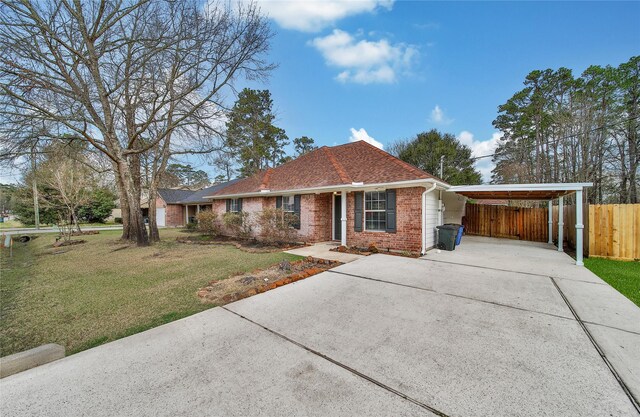 720 Springwood Dr, Conroe, TX 77385 - single story home with concrete driveway, brick siding, and a shingled roof