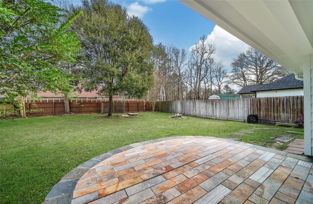 720 Springwood Dr, Conroe, TX 77385 - view of yard with a patio area