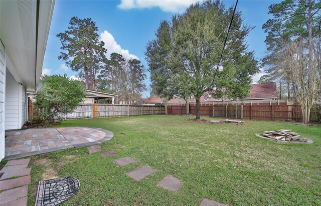 720 Springwood Dr, Conroe, TX 77385 - view of yard featuring a patio