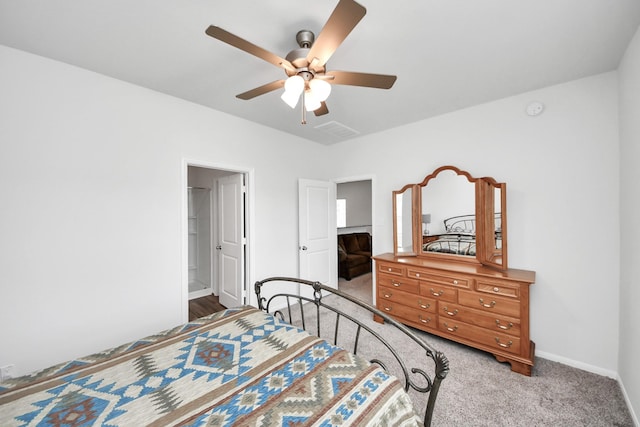 1110 Bending Trail Dr, Tomball, TX 77375 - carpeted bedroom featuring a ceiling fan and baseboards