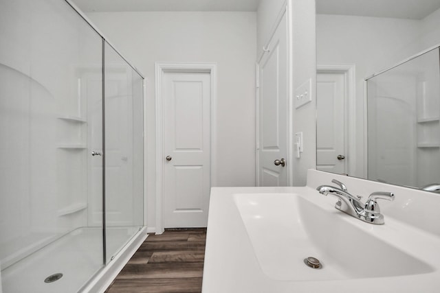 1110 Bending Trail Dr, Tomball, TX 77375 - bathroom featuring a shower stall, wood finished floors, and vanity