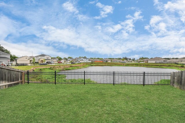1110 Bending Trail Dr, Tomball, TX 77375 - view of yard with a residential view and a water view