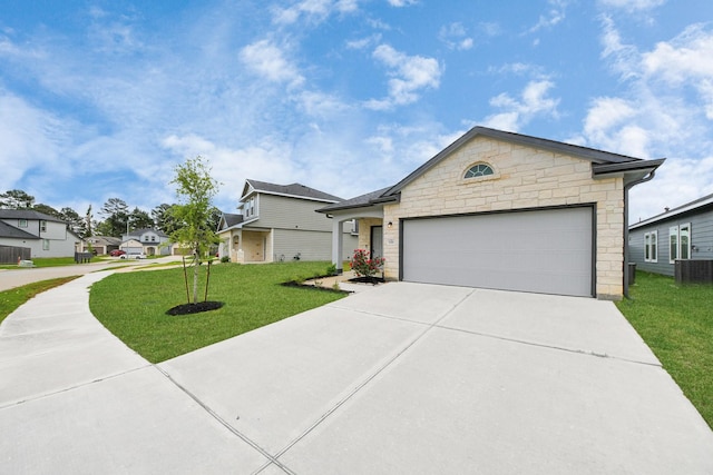 1110 Bending Trail Dr, Tomball, TX 77375 - view of front facade featuring stone siding, central air condition unit, driveway, a front yard, and an attached garage