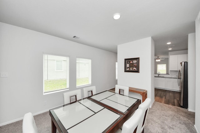 1110 Bending Trail Dr, Tomball, TX 77375 - dining space with dark carpet, recessed lighting, and baseboards