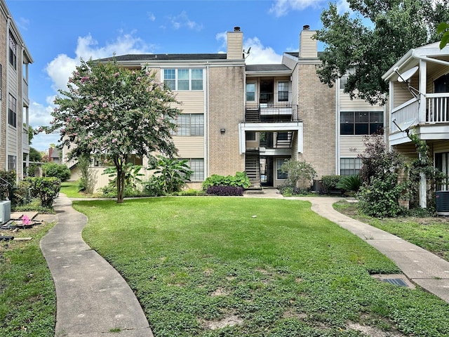 2750 Holly Hall St Unit 1215, Houston, TX 77054 - view of building exterior featuring cooling unit