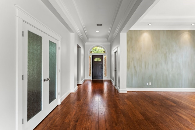 44 Vinebrook Rd, The Woodlands, TX 77380 - entrance foyer with french doors, hardwood / wood-style floors, ornamental molding, and baseboards