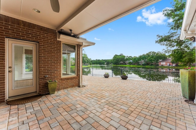 44 Vinebrook Rd, The Woodlands, TX 77380 - view of patio featuring a water view