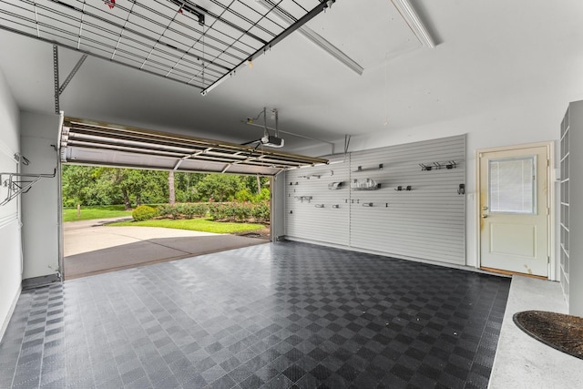 44 Vinebrook Rd, The Woodlands, TX 77380 - garage with a garage door opener