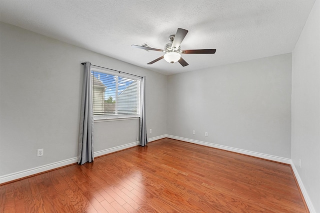 1646 W 13th St, Houston, TX 77008 - unfurnished room featuring wood finished floors, a ceiling fan, a textured ceiling, and baseboards