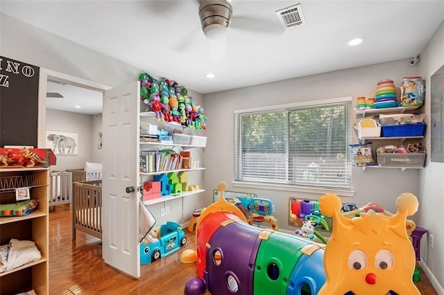 5302 Treaschwig Rd, Spring, TX 77373 - rec room featuring wood finished floors, a ceiling fan, and recessed lighting