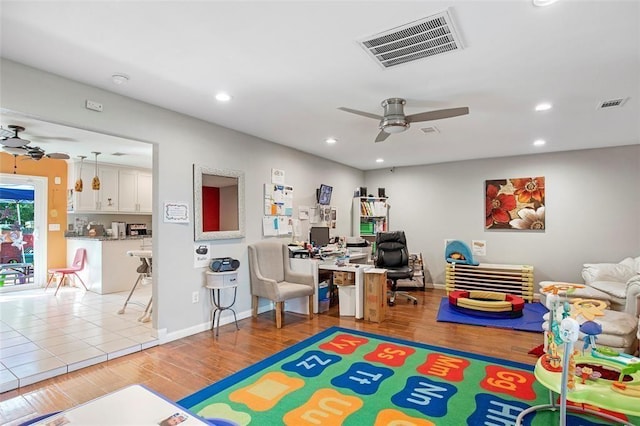 5302 Treaschwig Rd, Spring, TX 77373 - game room with ceiling fan, a desk, recessed lighting, wood finished floors, and baseboards