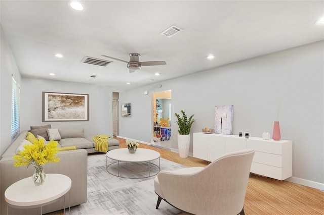 5302 Treaschwig Rd, Spring, TX 77373 - living room featuring recessed lighting, light wood-style flooring, ceiling fan, and baseboards