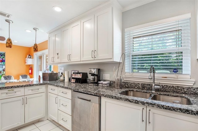 5302 Treaschwig Rd, Spring, TX 77373 - kitchen with a sink, dishwasher, white cabinetry, dark stone countertops, and recessed lighting