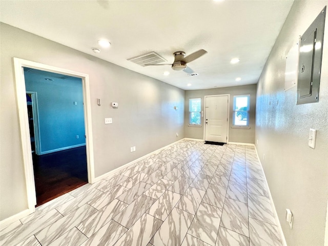 5302 Treaschwig Rd, Spring, TX 77373 - entryway featuring ceiling fan, light marble finish flooring, baseboards, and electric panel