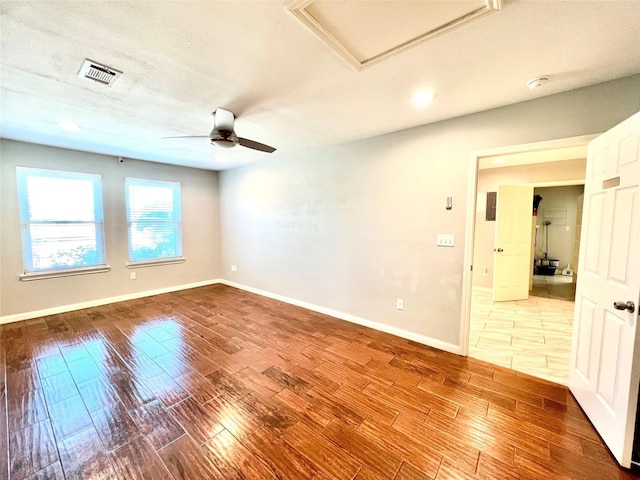 5302 Treaschwig Rd, Spring, TX 77373 - unfurnished room featuring wood finished floors, a ceiling fan, baseboards, and recessed lighting