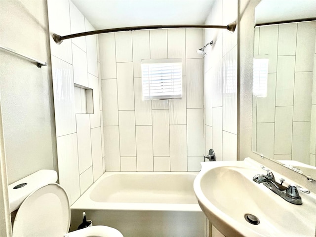 5302 Treaschwig Rd, Spring, TX 77373 - bathroom with a sink, toilet, and bathtub / shower combination