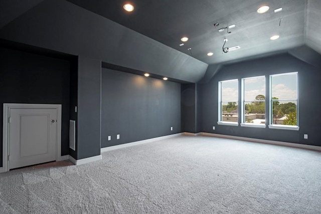 9948 Woodwind Ln N, Houston, TX 77025 - additional living space featuring carpet, vaulted ceiling, baseboards, and recessed lighting