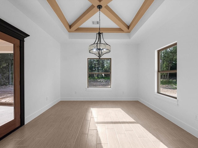 17107 Alara Dr, Splendora, TX 77372 - unfurnished room featuring a chandelier, beam ceiling, baseboards, wood finished floors, and coffered ceiling
