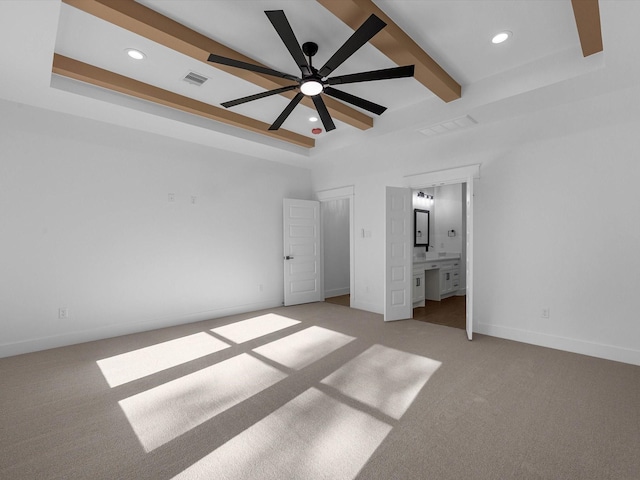 17107 Alara Dr, Splendora, TX 77372 - unfurnished bedroom featuring light colored carpet, recessed lighting, baseboards, ensuite bath, and beamed ceiling