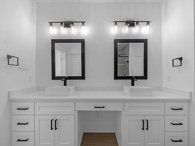 17107 Alara Dr, Splendora, TX 77372 - full bathroom featuring double vanity and a shower with door