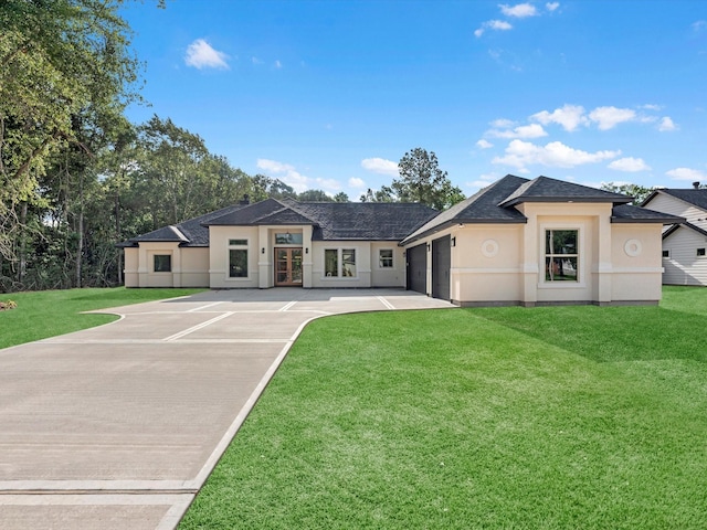 17107 Alara Dr, Splendora, TX 77372 - view of front facade featuring french doors, stucco siding, a front yard, and roof with shingles