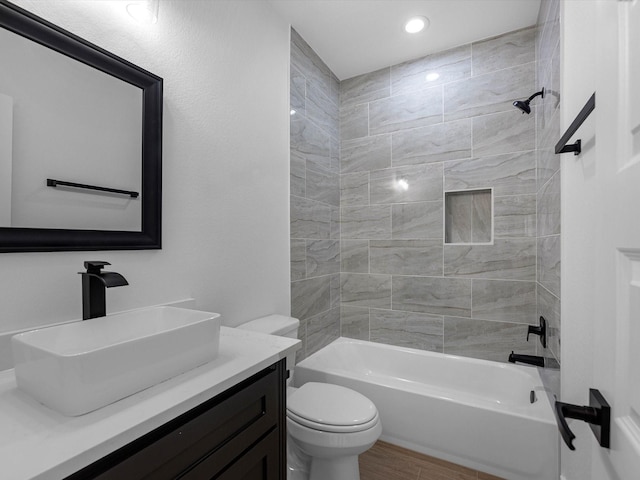 17107 Alara Dr, Splendora, TX 77372 - full bathroom featuring vanity, toilet, shower / tub combination, wood finished floors, and recessed lighting