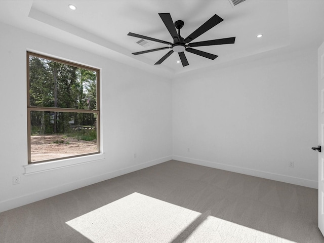 17107 Alara Dr, Splendora, TX 77372 - carpeted empty room with recessed lighting, a tray ceiling, ceiling fan, and baseboards